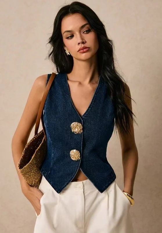 0-02-05-7e2ab817cc84a5e379660aeae95ffe4386bdfb0e2caf93708db925be3cd768df_22294656cc8 Vintage Denim Vest Top - Image 1