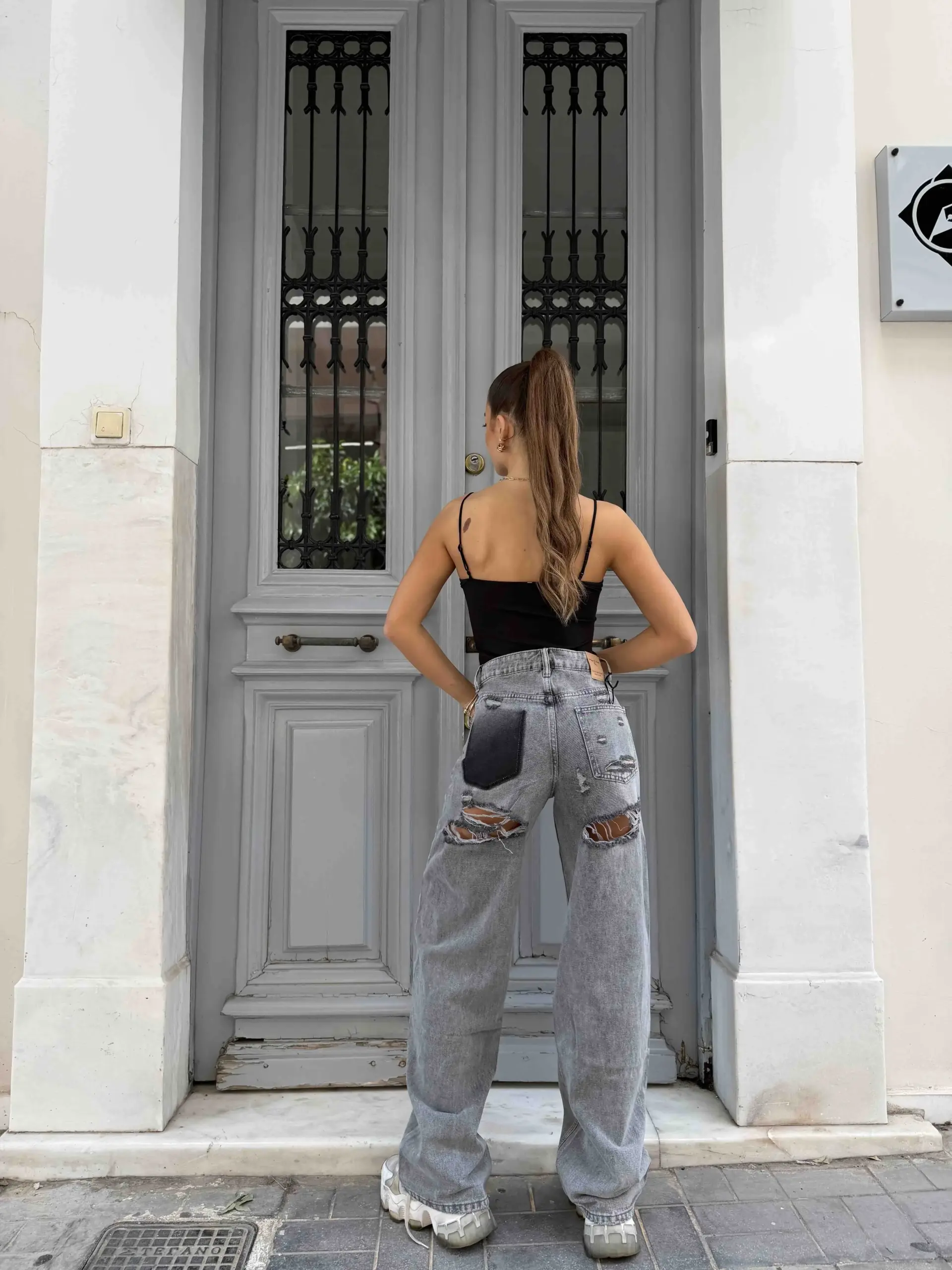 0-02-05-956eb3dfd09fb7fb7e14dec312b5f0f3ec6ff3e36fe079dcbb5da0274e1f11f6_22638e1fc54 Grey Wide Leg Distressed Jeans - Image 1