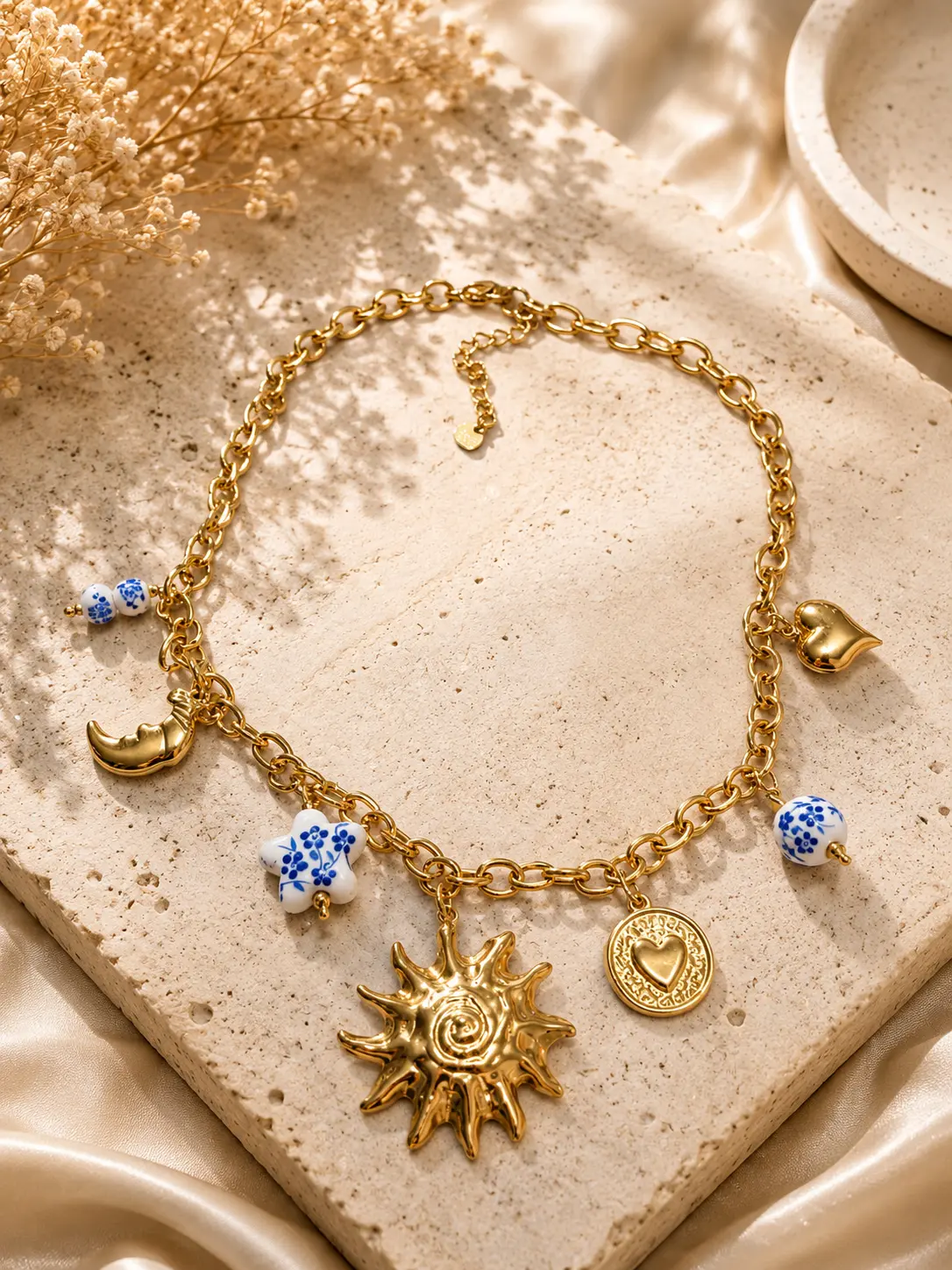 img_6a0562c04a9148.10521065.webp Golden Soleil Charm Necklace - Image 1