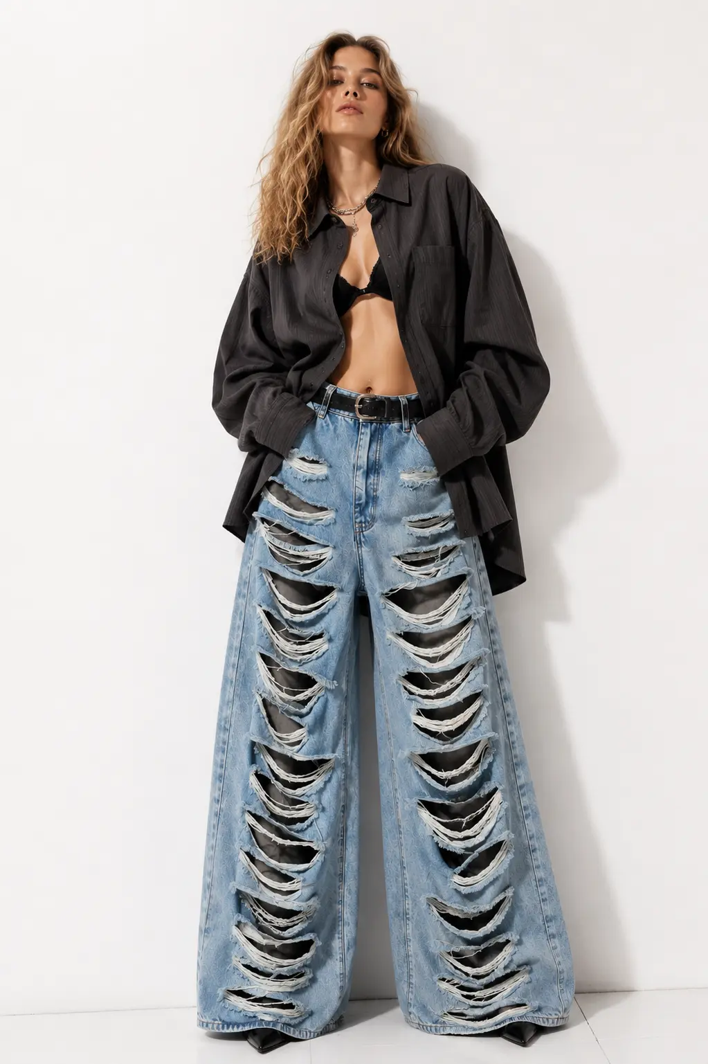 img_6a7f442f333369.20680217 Rebel Ripped Camo Wide Leg Jeans - Image 1